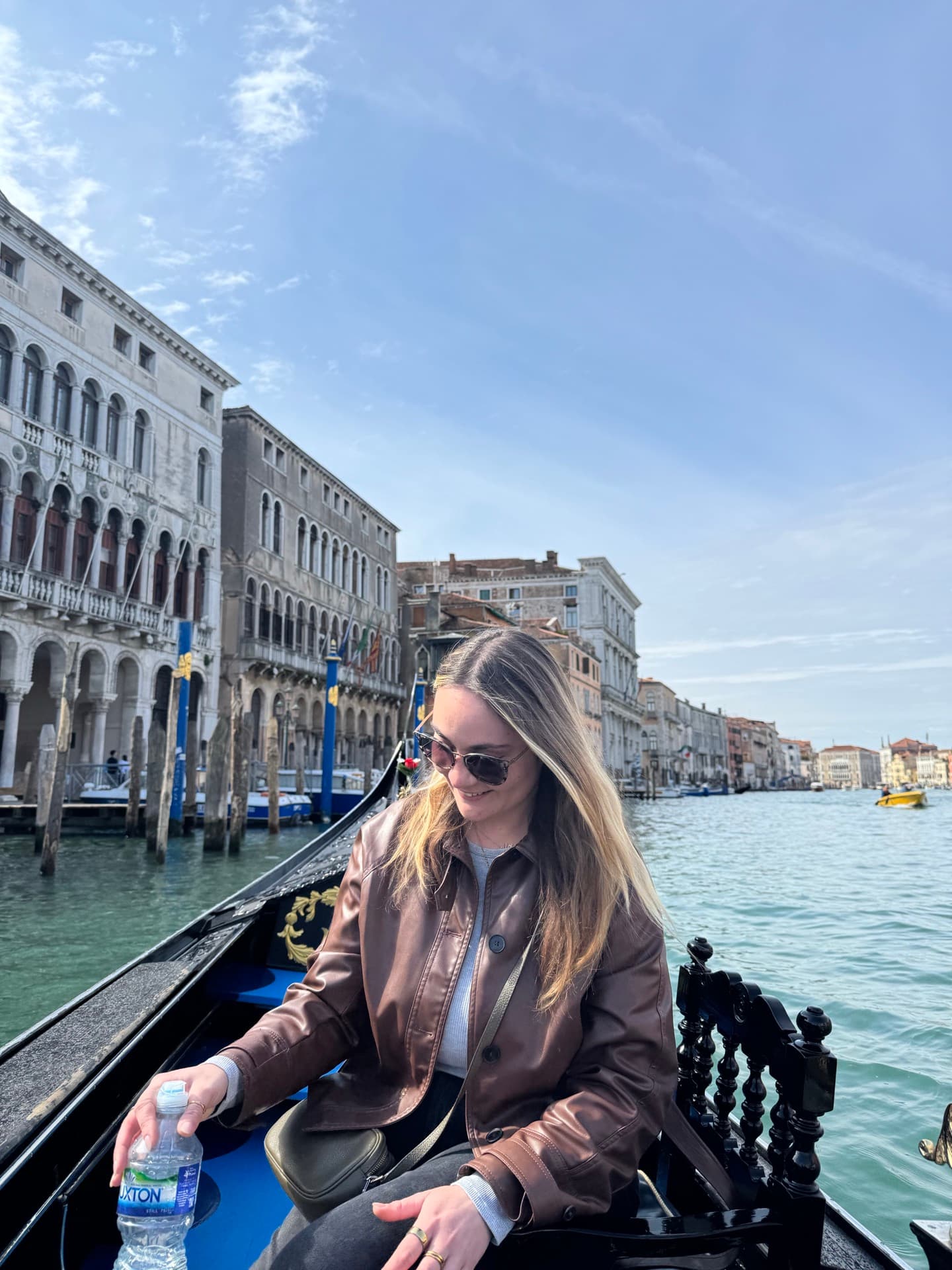 Ellie posing in the gondola on the Grand Canal