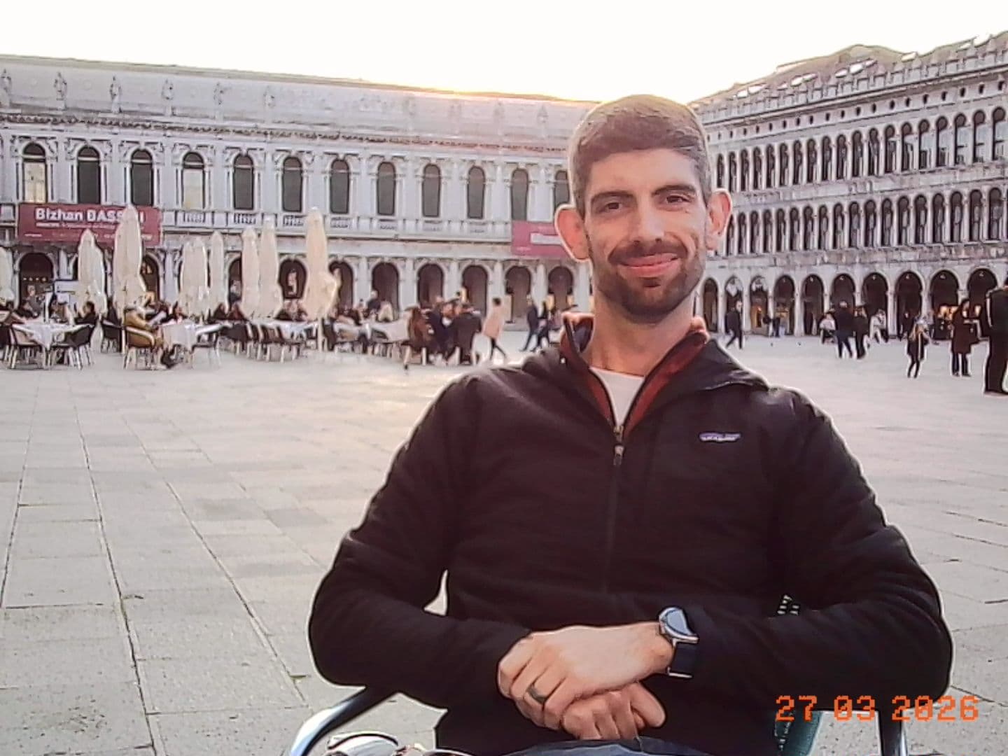 Zac posing at the Procuratie colonnade in St. Mark's Square