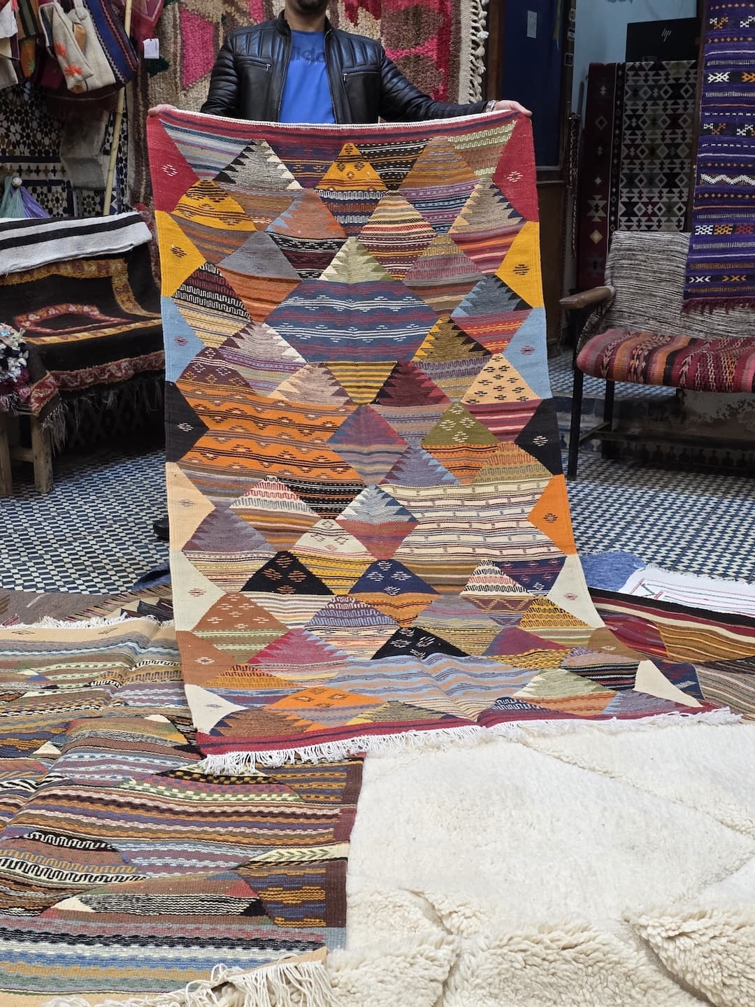 Rugs on display at the rug shop in the Fes medina